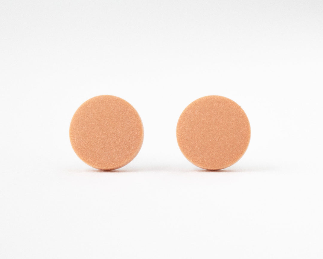 pumpkin orange stud earrings front