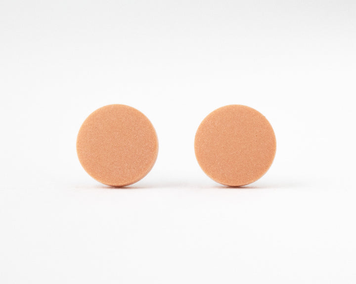 pumpkin orange stud earrings front