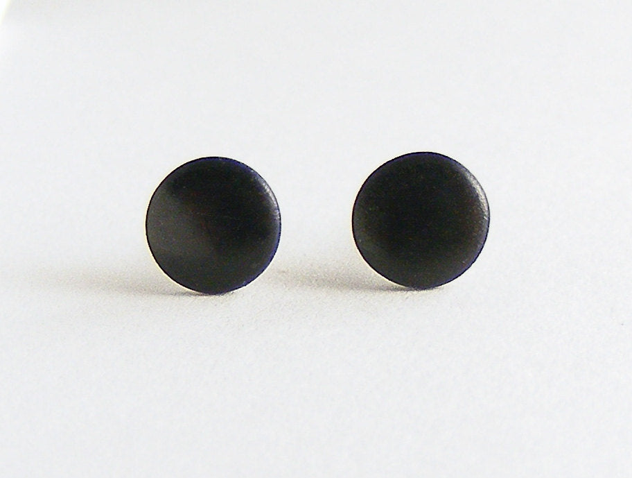 black stud earrings front view