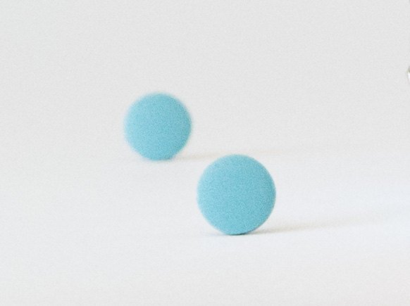 light blue studs bokeh view