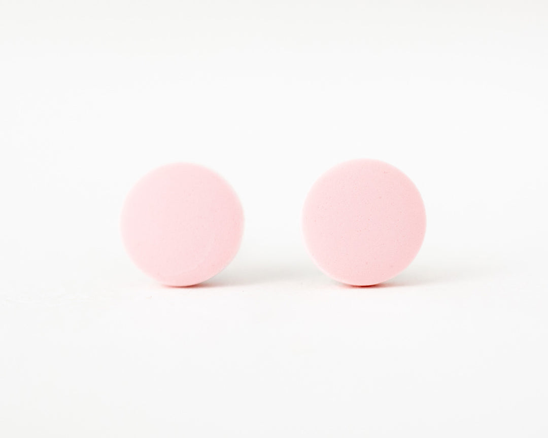 pale pink stud earrings front