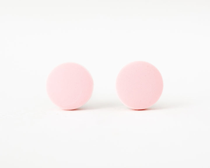 pale pink stud earrings front