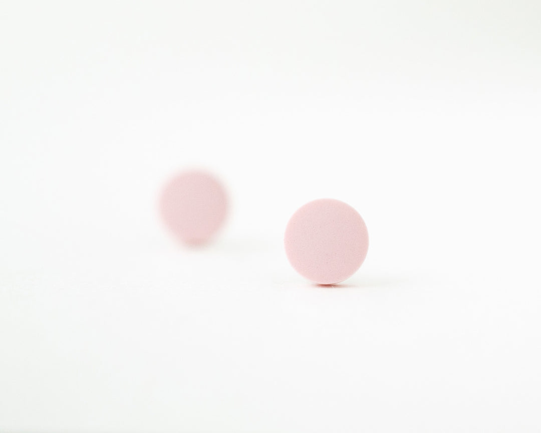 pale pink studs bokeh view
