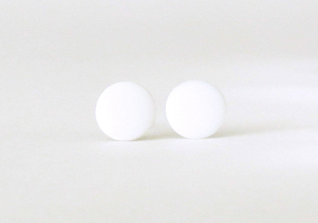 white stud earrings front