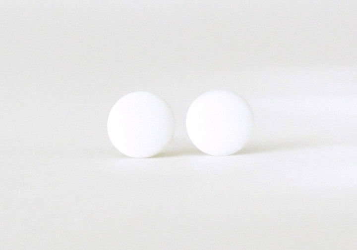 white stud earrings front