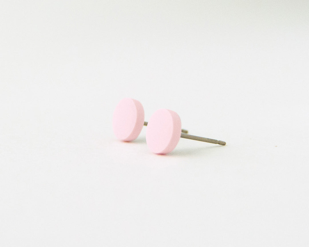 pale pink stud earrings 45 degree angle